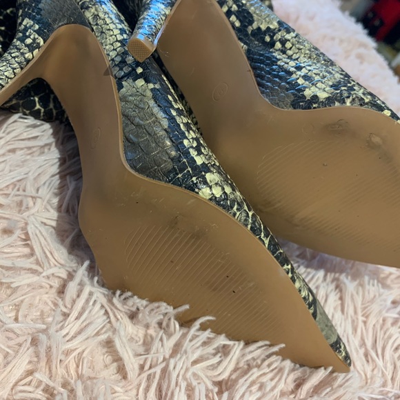 Worn indoor once.  Love but injured my ankle.   Sexy thigh high boots - Picture 2 of 7